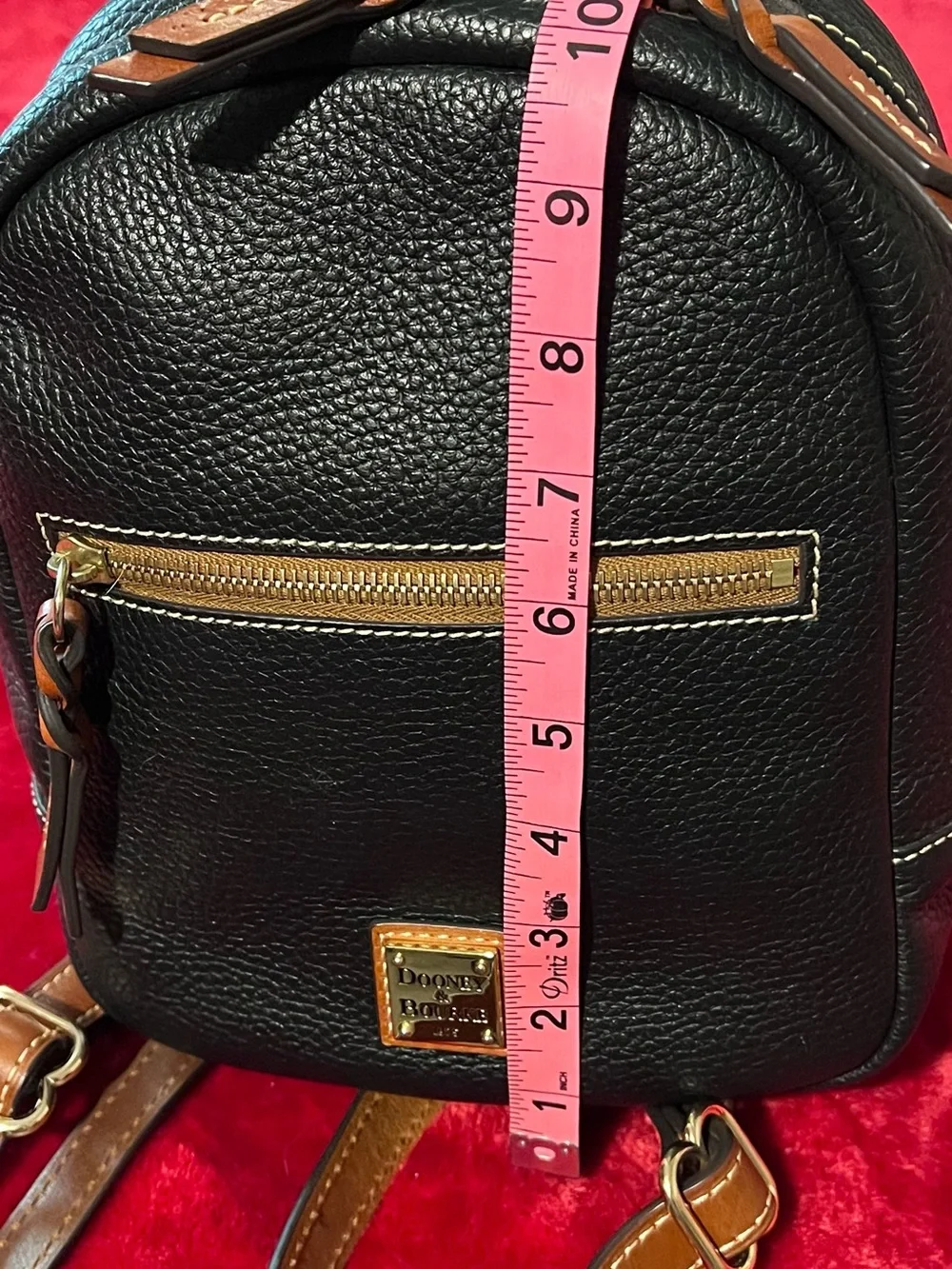 Dooney & Bourke Black Pebbled Leather Mini Backpack with Brown Trim